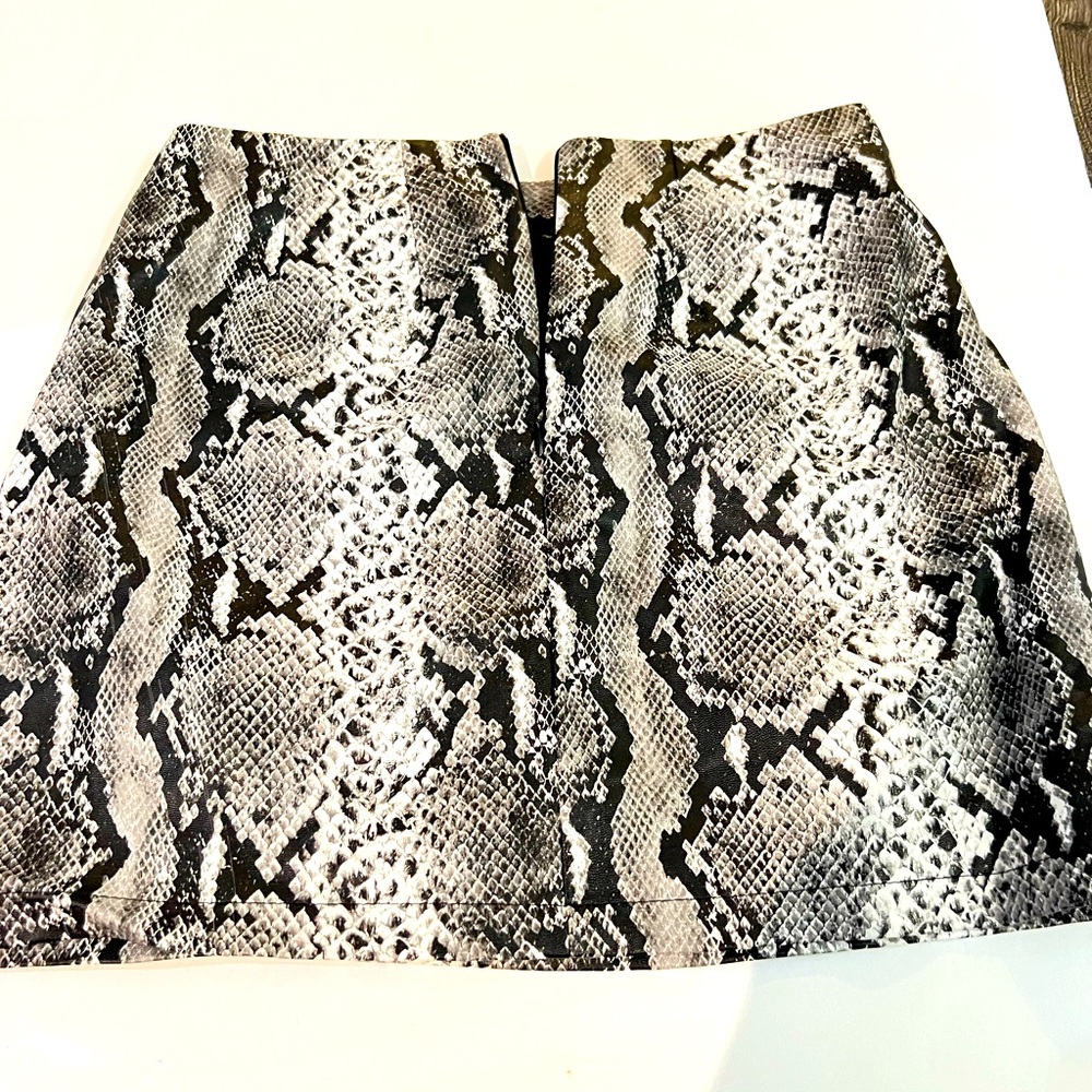 Vegan leather animal print mini skirt